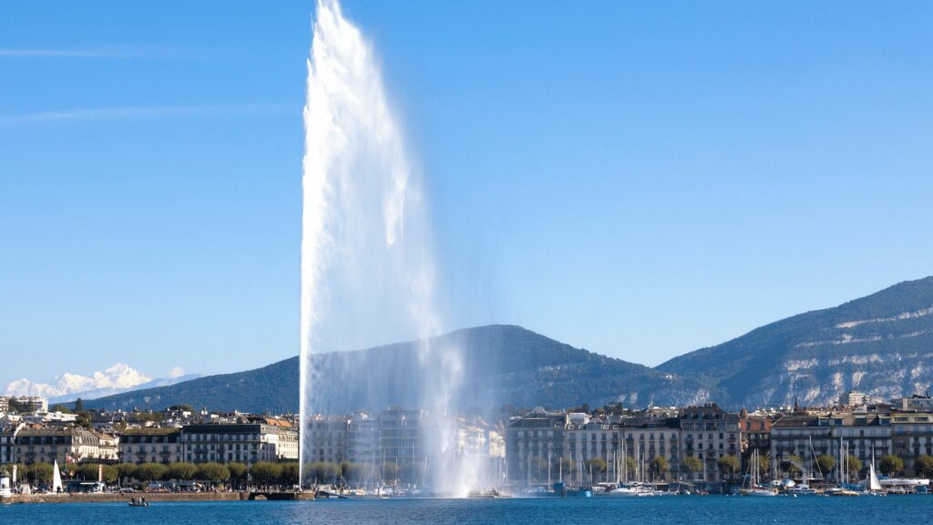 Jet d'Eau de Genève sur le lac Léman, symbole de la ville, à proximité de LaserAddict Genève spécialisé dans l'accompagnement au laser doux pour le bien-être et les addictions.